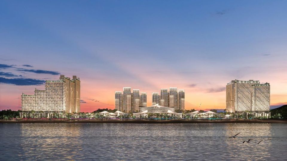 Phối cảnh sáu toà tháp Blanca của Blanca City nhìn từ biển lúc chiều muộn, mặt đứng trắng dạng cánh buồm soi xuống mặt nước