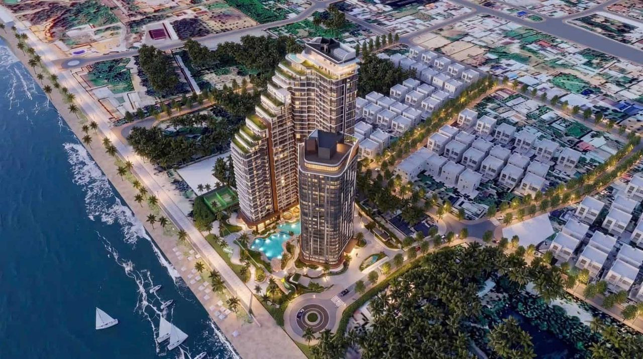 Phối cảnh Solina Vũng Tàu lúc chiều tối nhìn từ trên cao, đèn hai tháp bật sáng bên bờ biển