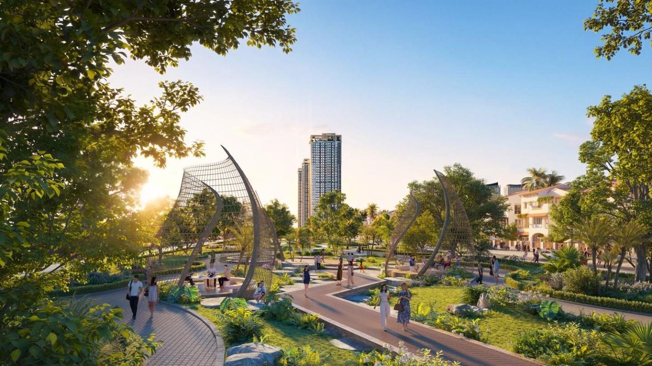 Phối cảnh công viên chủ đề trong Blanca City với tượng điểm nhấn, lối đi bộ uốn lượn giữa cây xanh và tháp cao tầng phía xa